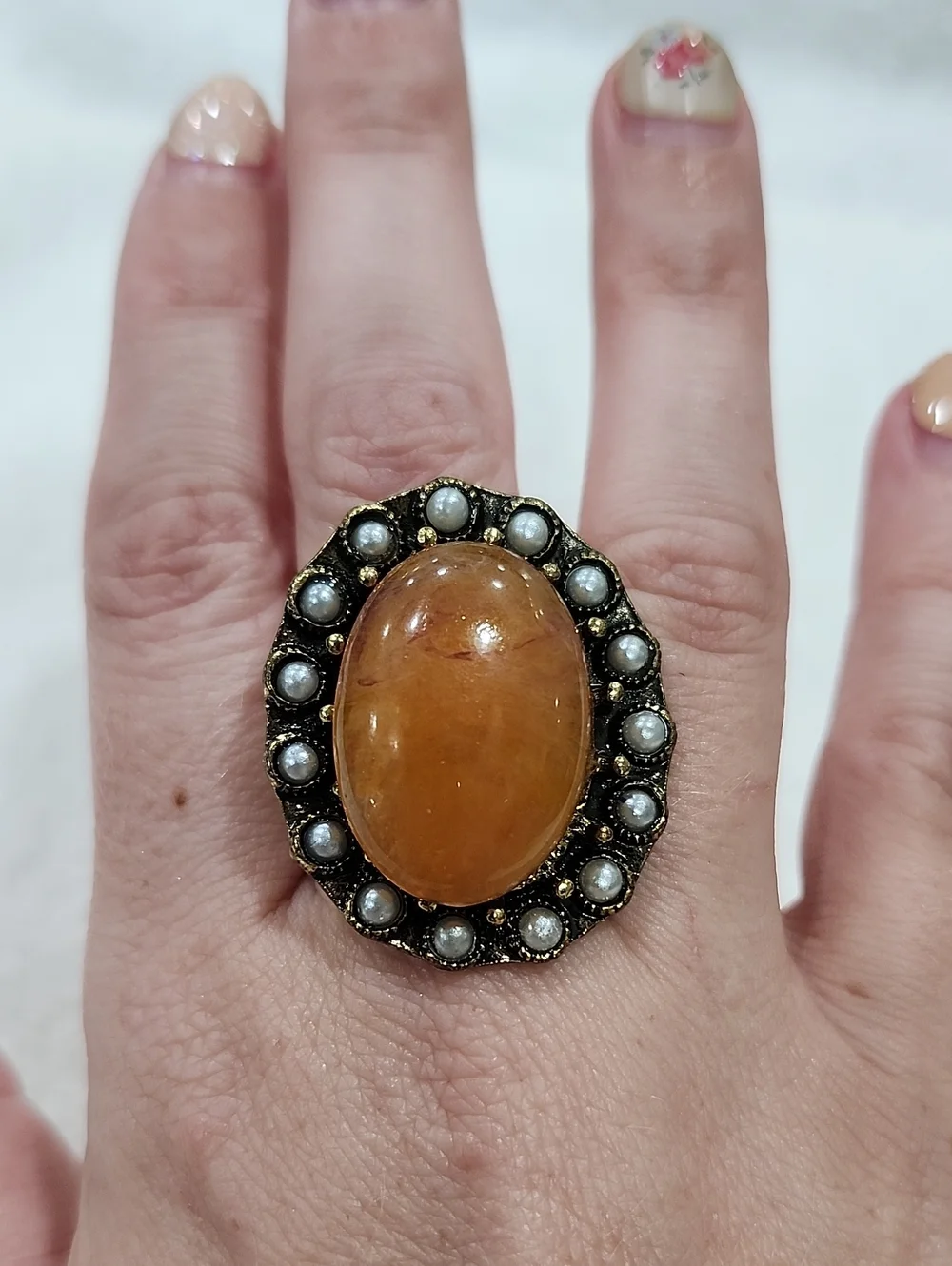 Vintage-Inspired Gold and Amber Statement Ring with Faux Pearl Halo